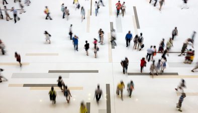 Groups of people walking in a building